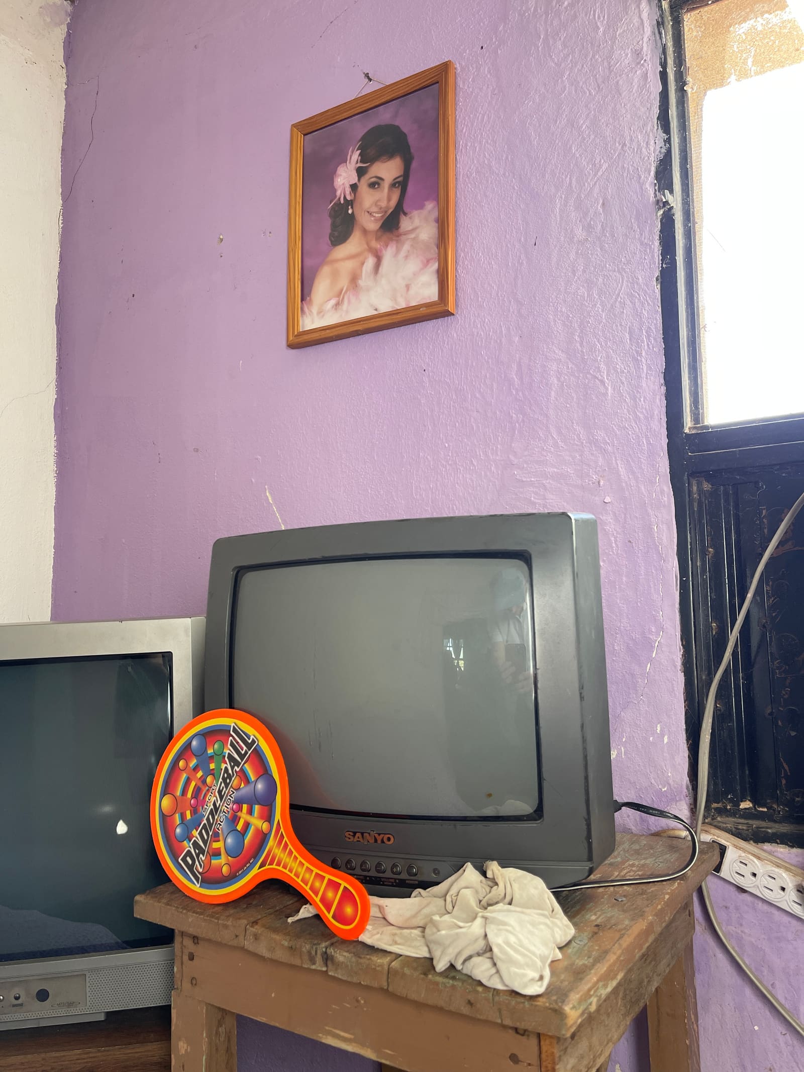 One of the Rancho's rooms, faded family photos on the wall