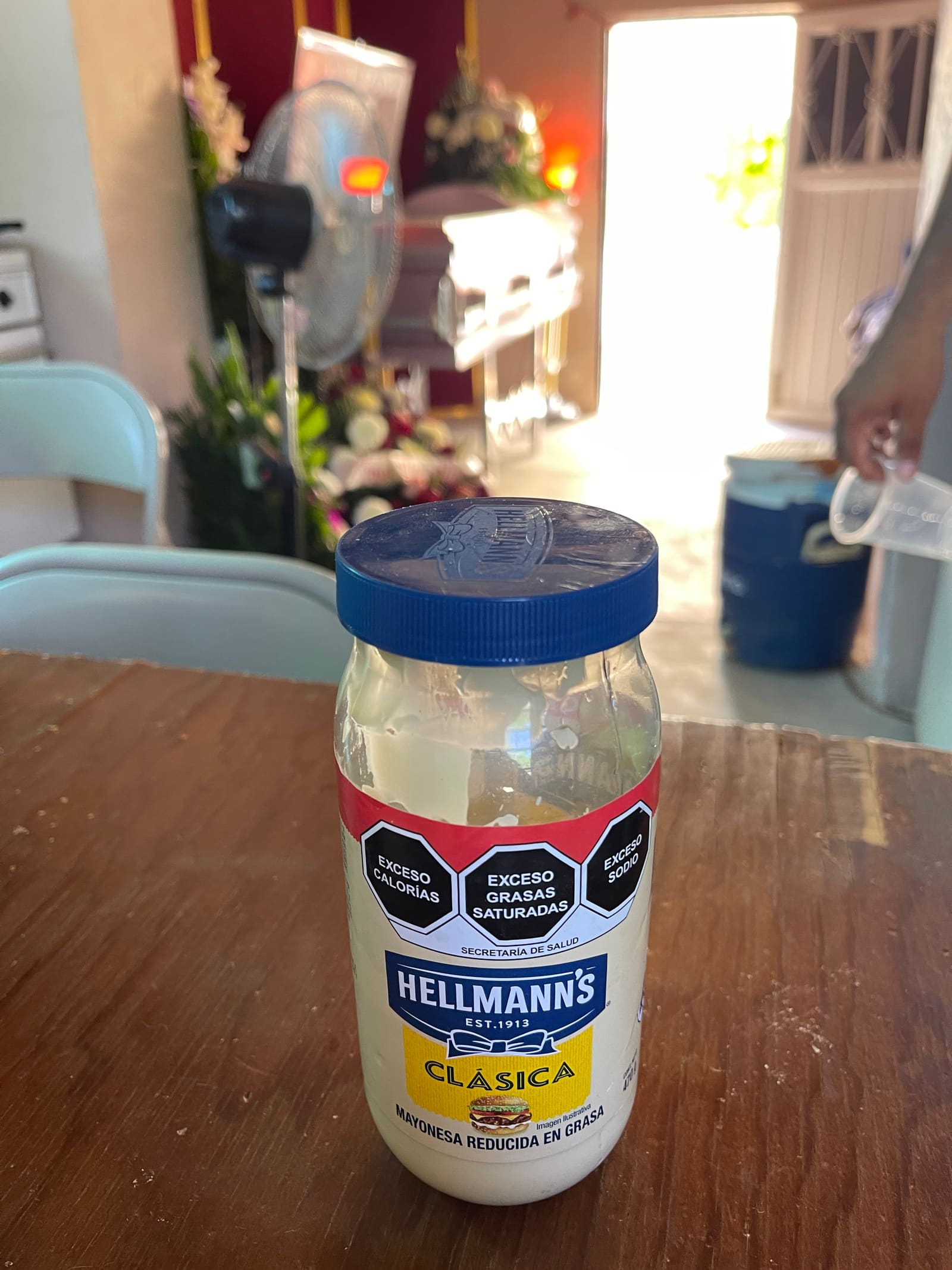 Hellmann's mayonnaise, warning labels and all, on the kitchen table