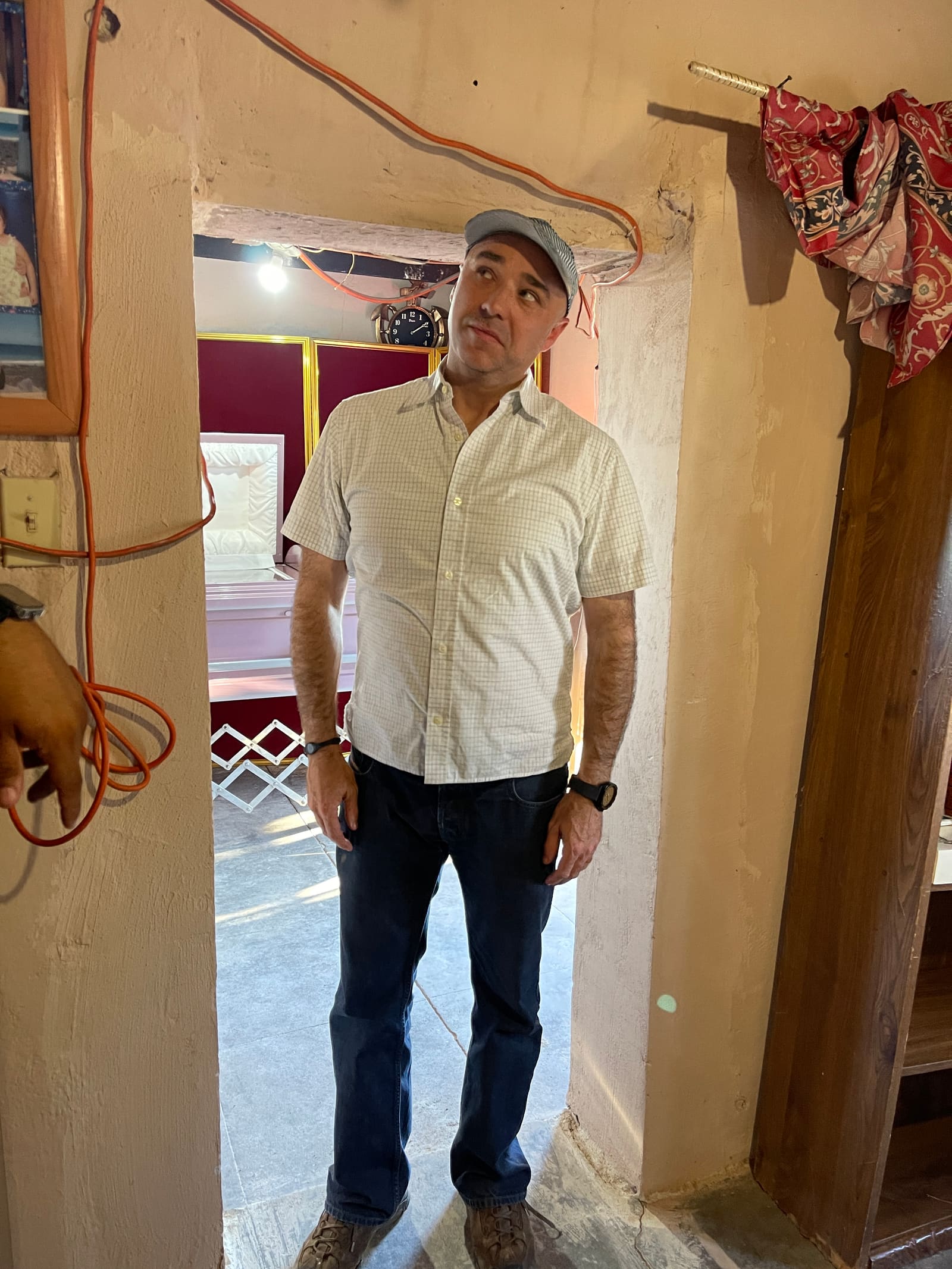 Tio Javier ducking through one of the Rancho's original low doorways
