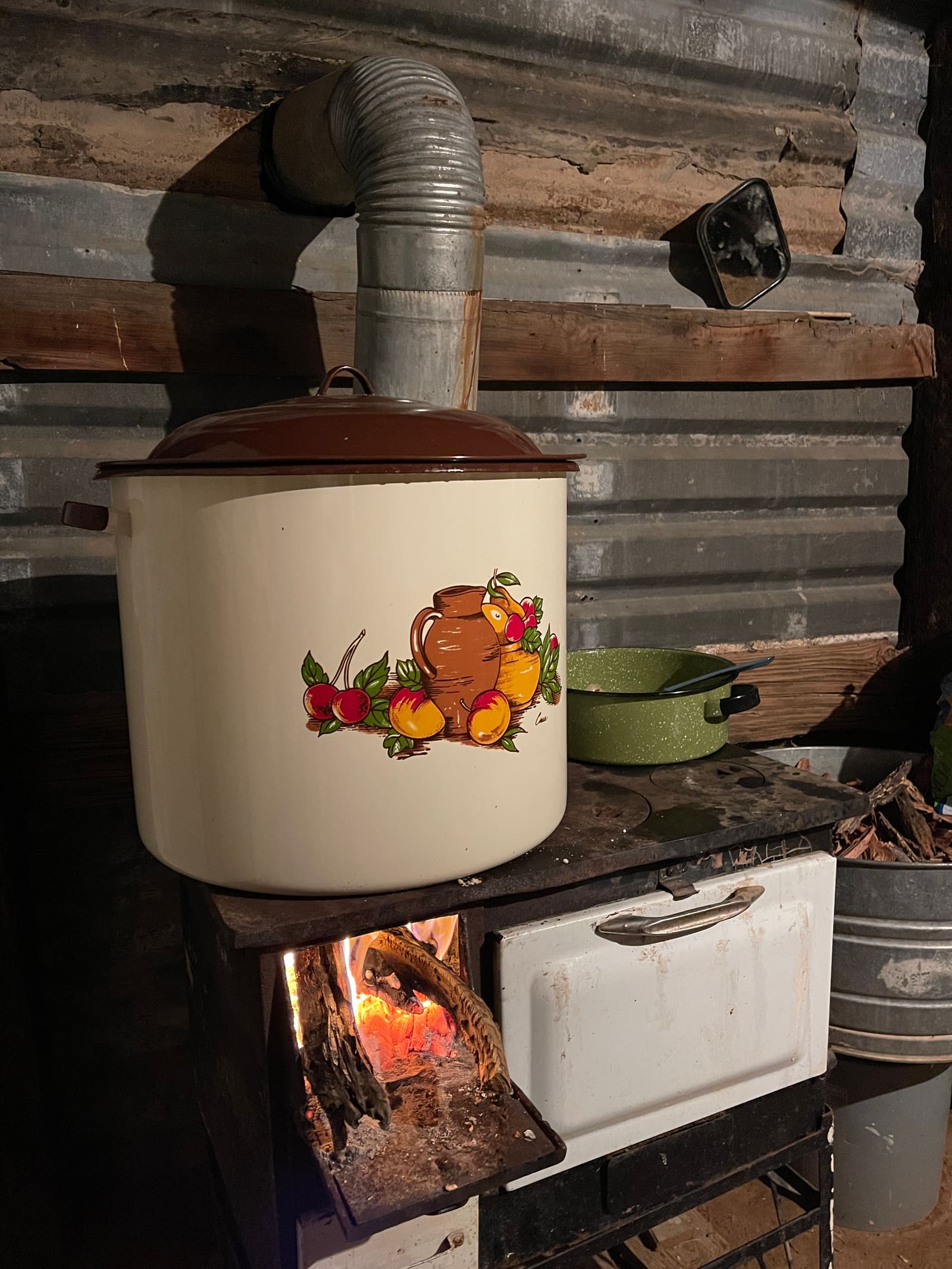 The wood stove, simmering a huge pot of menudo